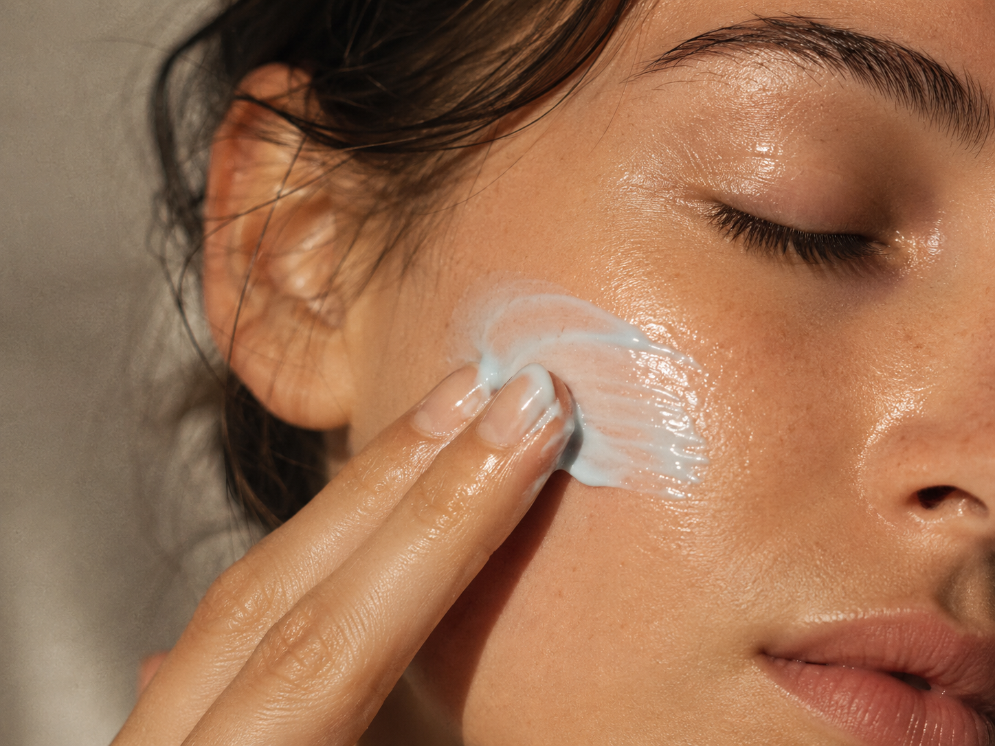 Cream absorbing into skin
